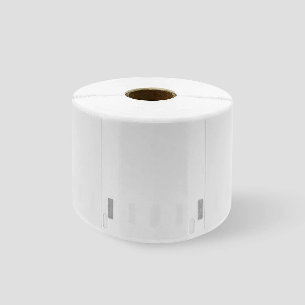 White label roll end view showing central dispensing hole.