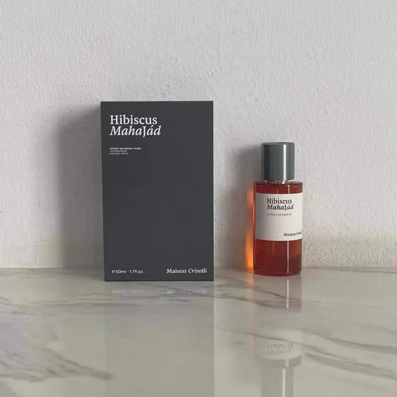 Maison Crivelli Hibiscus Mahajád unisex 50ml Extrait de Parfum. Elegant cylindrical amber bottle with minimalist box.