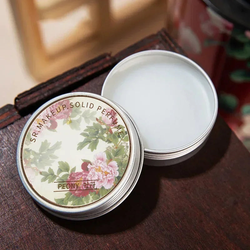 Tidesmit portable solid perfume balm for women featuring a fresh, elegant, long-lasting floral body fragrance.