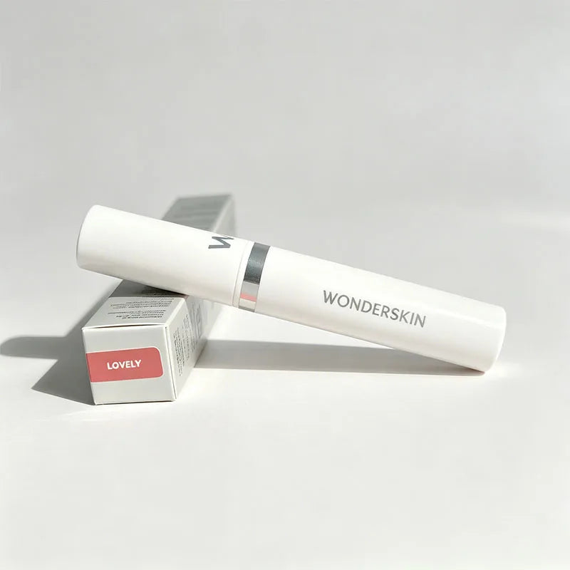 Wonderskin long-lasting waterproof peel-off lip stain in Lovely pink shade, white tube packaging with retail box.