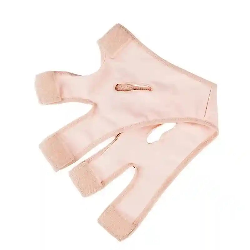 Light pink elastic face-slimming bandage with Velcro straps and ear cutouts, on a white background.