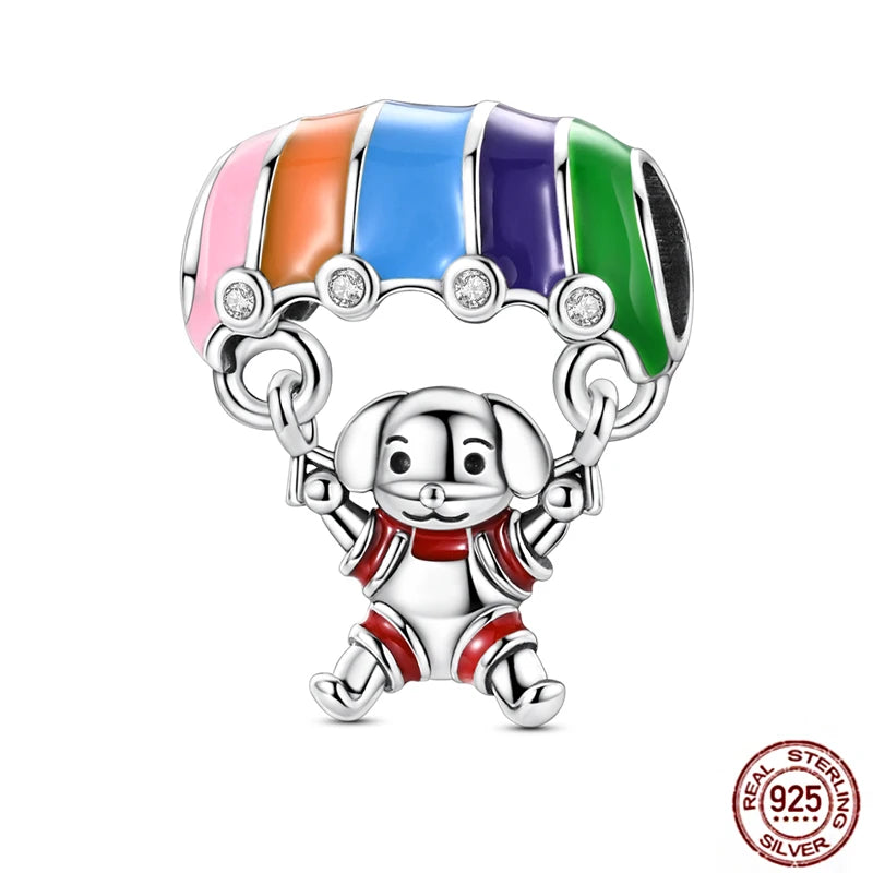 925 Sterling Silver puppy charm with colorful enamel parachute for DIY bracelets and pet-themed jewelry.