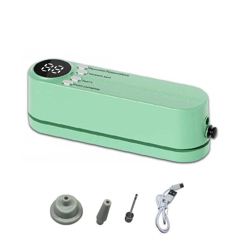 Compact vacuum sealer machine in mint green with control panel and power cable