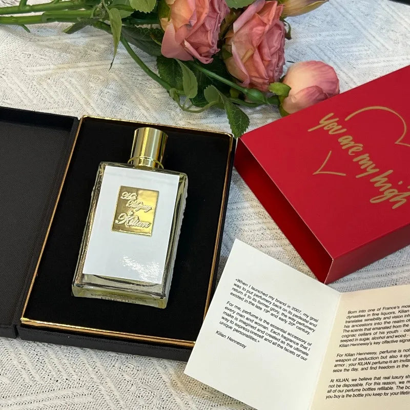 Kilian 50ml unisex floral chypre perfume. Rectangular glass bottle, peach, rum, rose, cedar notes. Elegant luxury scent.