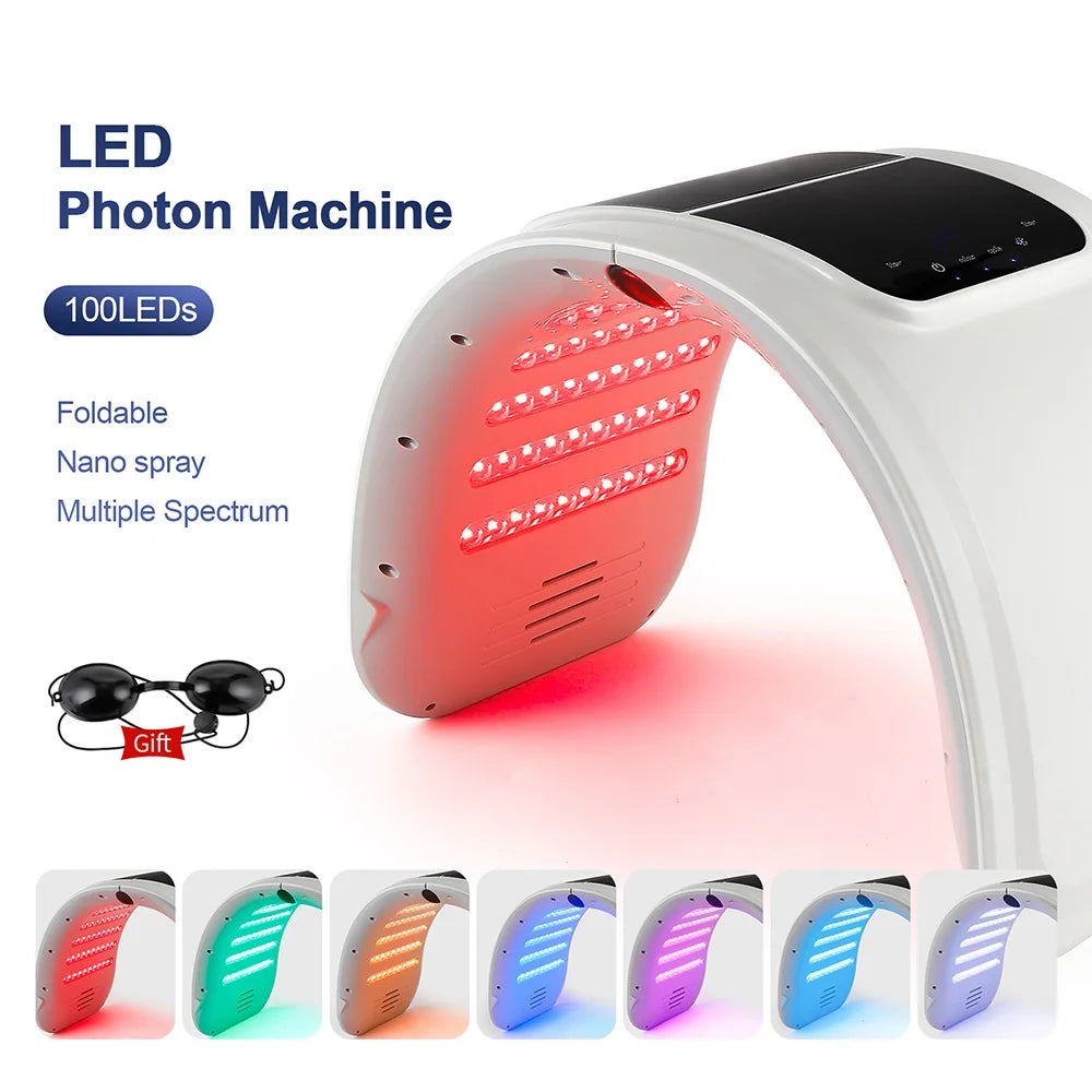 Foldable white LED photon machine for facial skin therapy with multiple light colors and protective eye goggles.