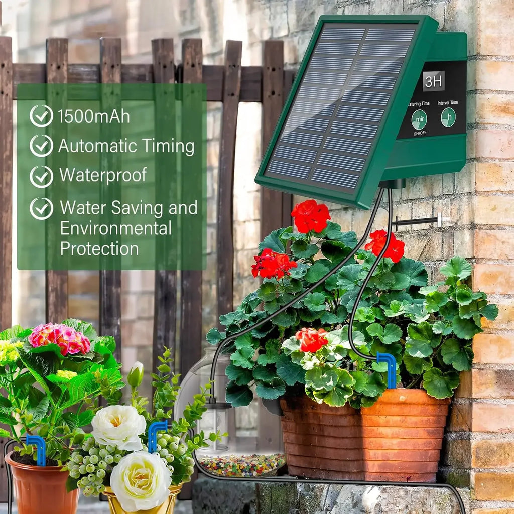 Solar drip irrigation kit with green control box and solar panel beside potted flowers