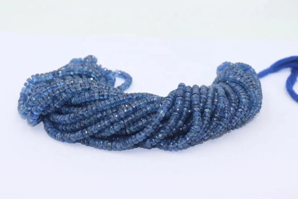 Looped strand of blue faceted kyanite rondelle beads with drilled holes