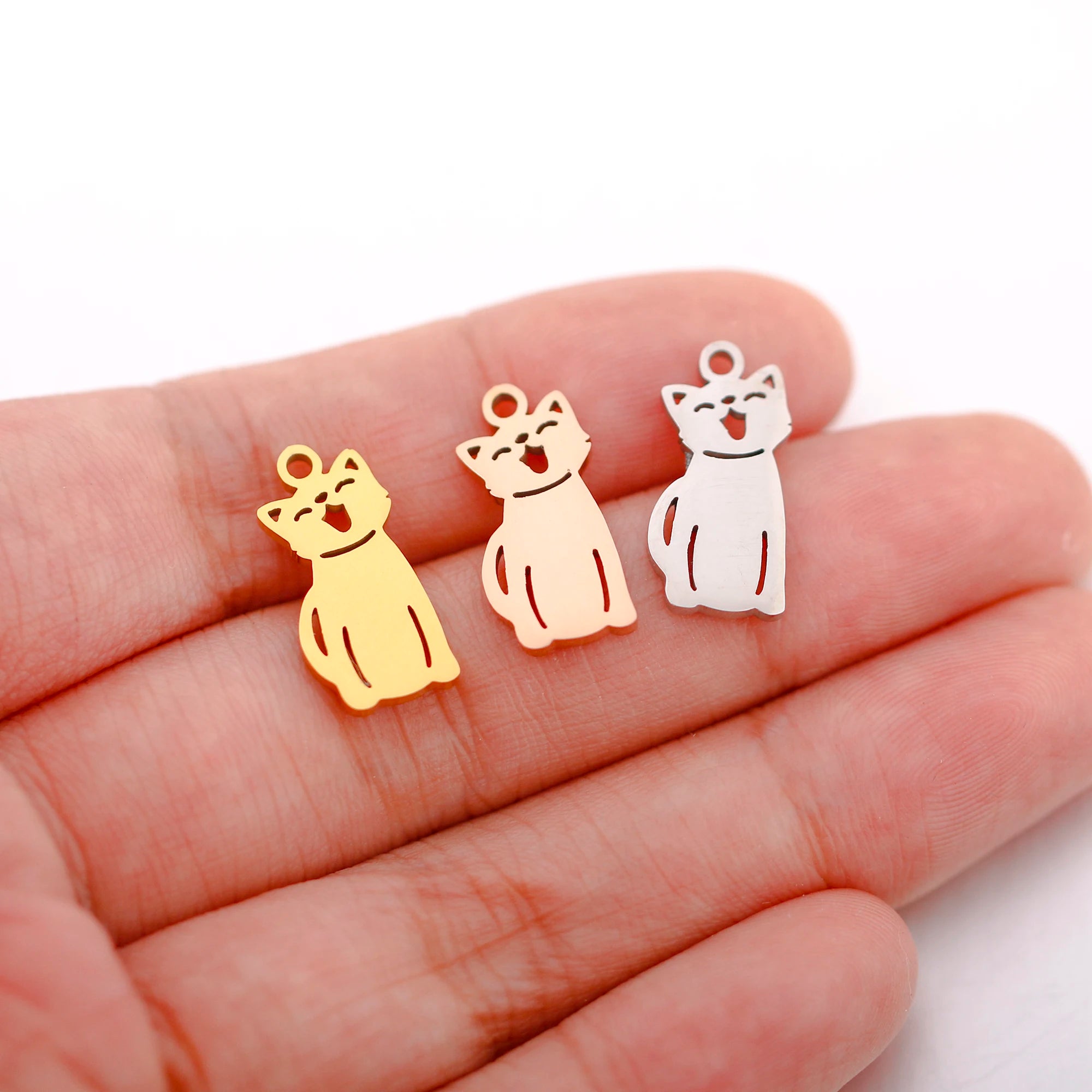 Gold, rose gold, and silver stainless steel cat charms for DIY pet jewelry, necklaces, and bracelets.