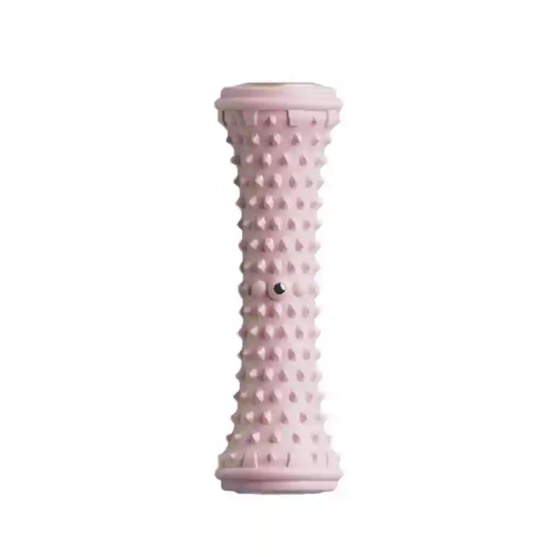 Pink spiked plantar fascia foot massage roller for muscle relaxation, yoga, and fitness recovery on a white background.