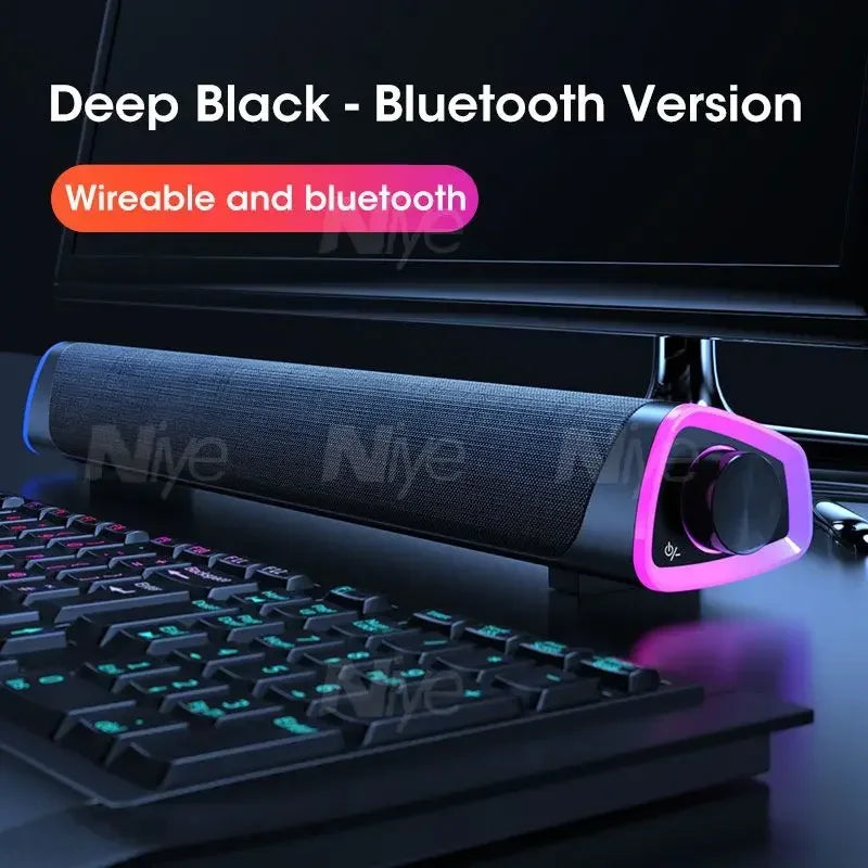 Deep black Bluetooth sound bar speaker with pink and purple side RGB driver