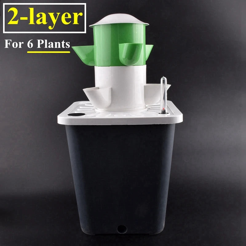 2-tier vertical hydroponic vegetable planter tower with green top and white baskets over black base