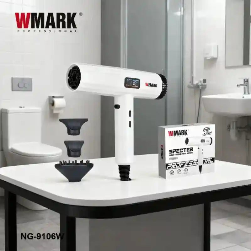 White WMARK NG-9106W professional hair dryer with LCD display, three nozzle attachments, and box on bathroom table.