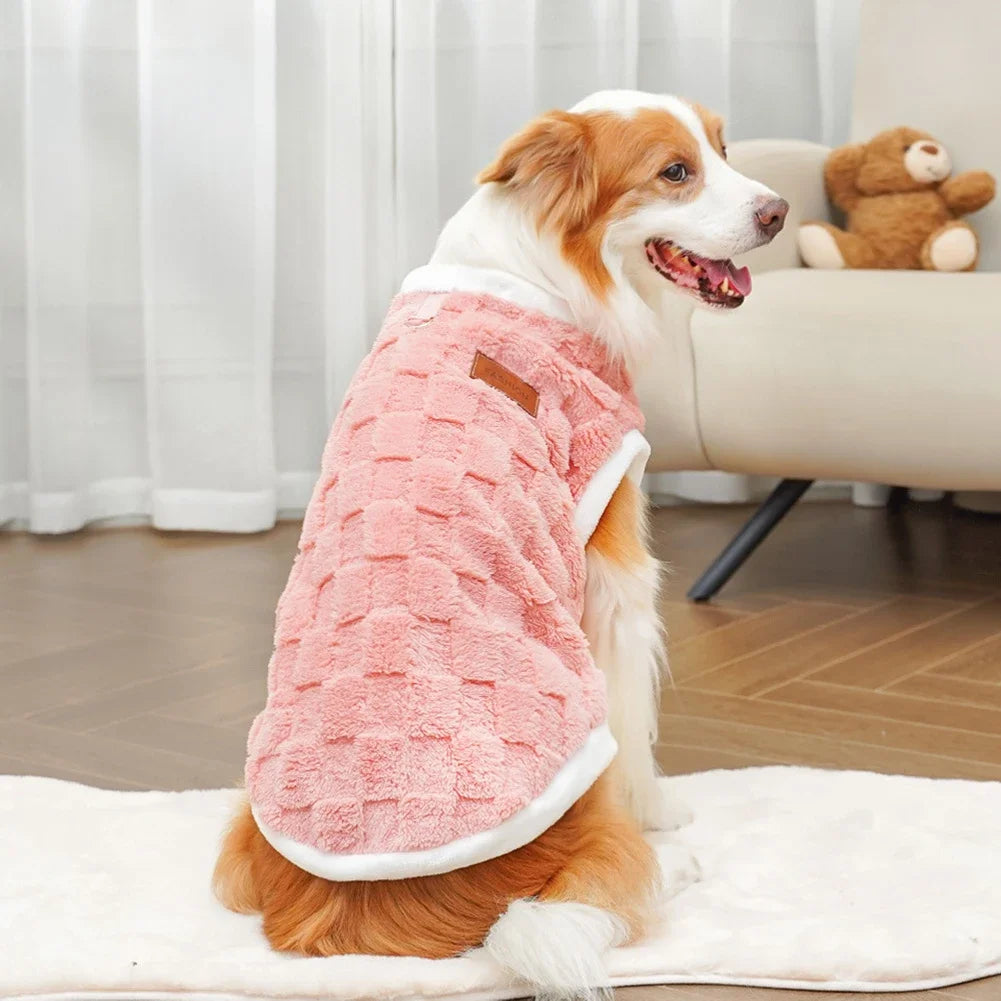 Dog wearing a cozy pink checkered winter fleece sweater for warmth and comfort. Available in sizes S-8XL for all breeds.