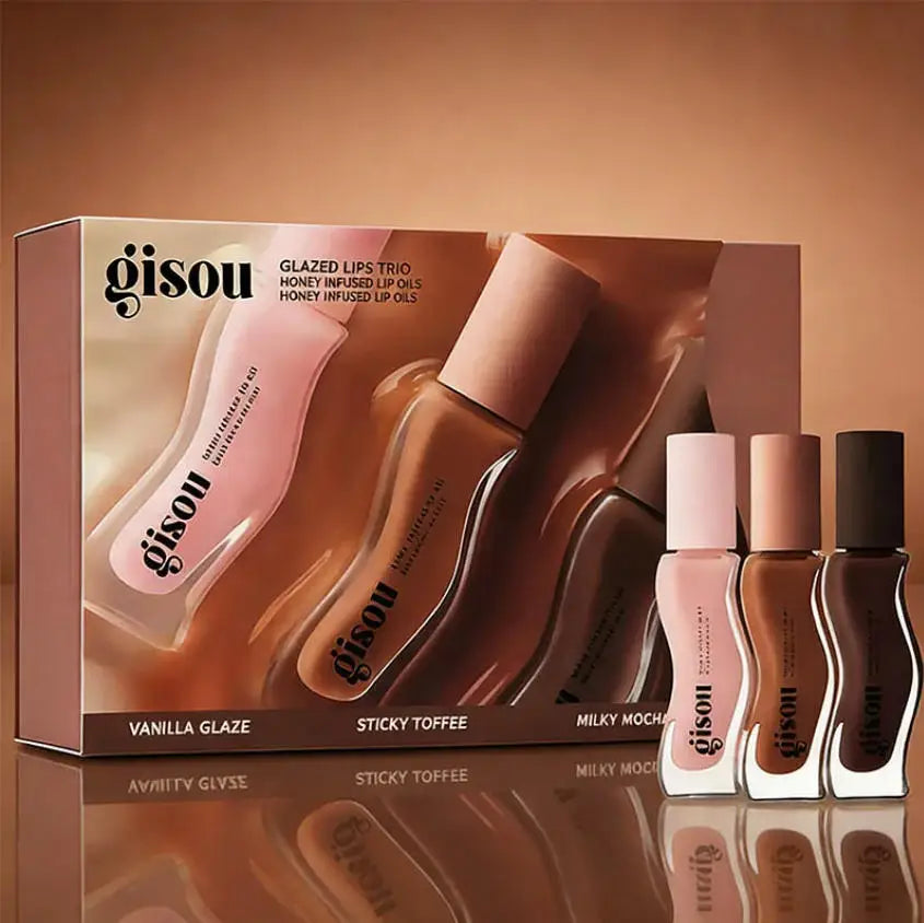 Gisou Glazed Lips Trio: Honey-infused moisturizing lip oil set in glossy vanilla, toffee, and mocha shades for plump lips.