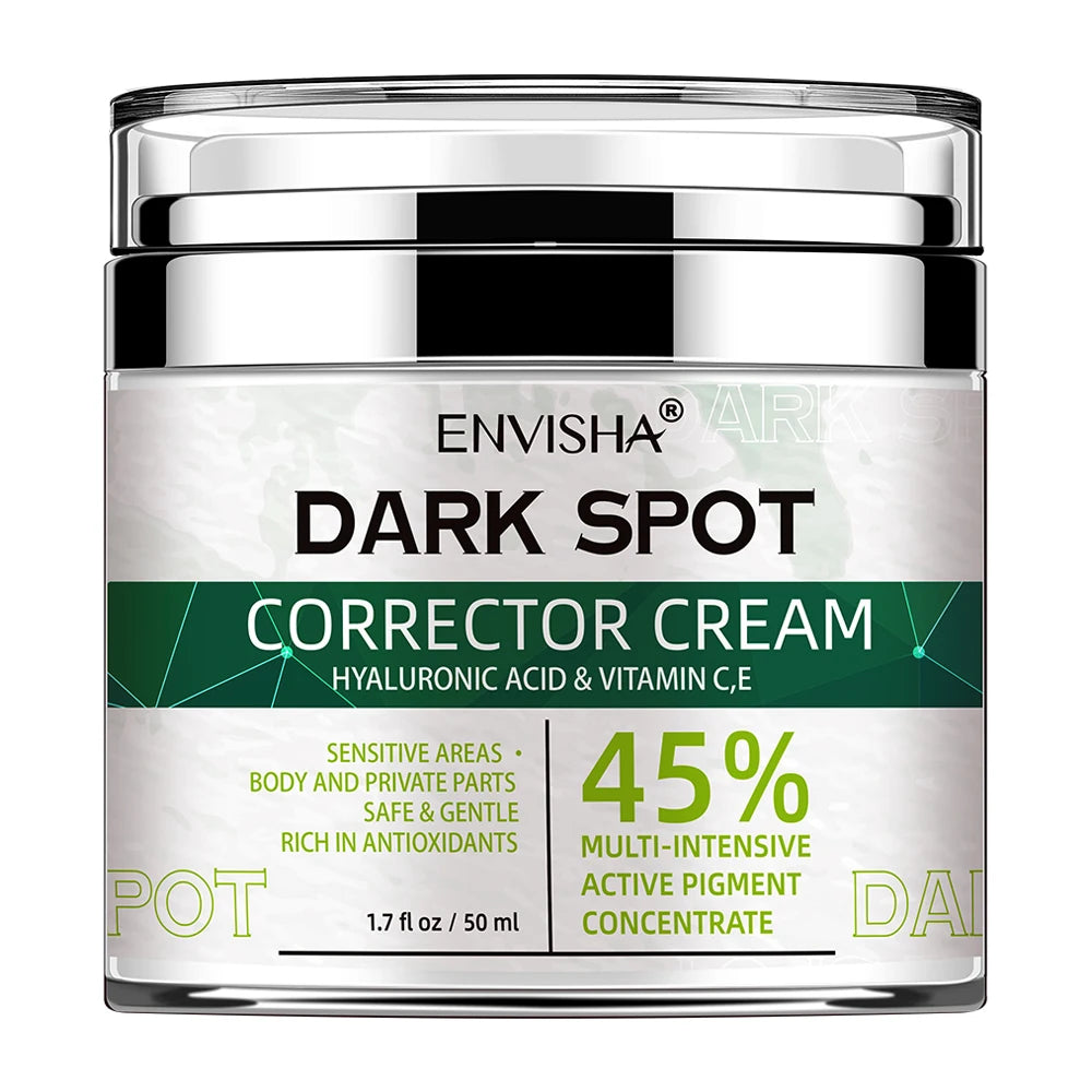 ENVISHA Dark Spot Corrector Cream in a round, silver-capped jar with a white and dark green label.