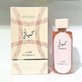 Hayaati Florence perfume in a rectangular glass bottle with rose-tinted liquid and matching patterned box.