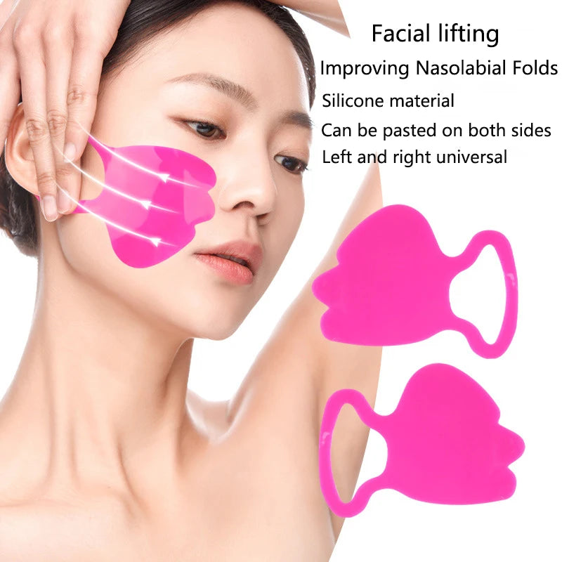 A person applies a bright pink, winged silicone anti-wrinkle patch to their cheek to target nasolabial folds.