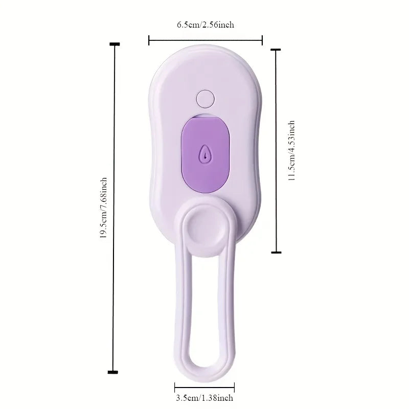 Purple 3-in-1 steam pet brush for cats and dogs. USB rechargeable, foldable design with soft silicone bristles.