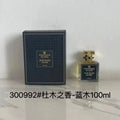 Fragrance Du Bois Oud Bleu Intense unisex parfum: luxury woody aromatic scent in a square glass bottle with gold cap.