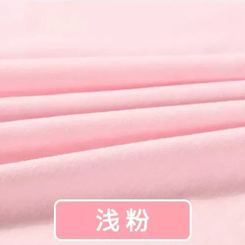 Light pink Tidesmit jersey knit fabric folded to show soft texture for baby garment sewing material.