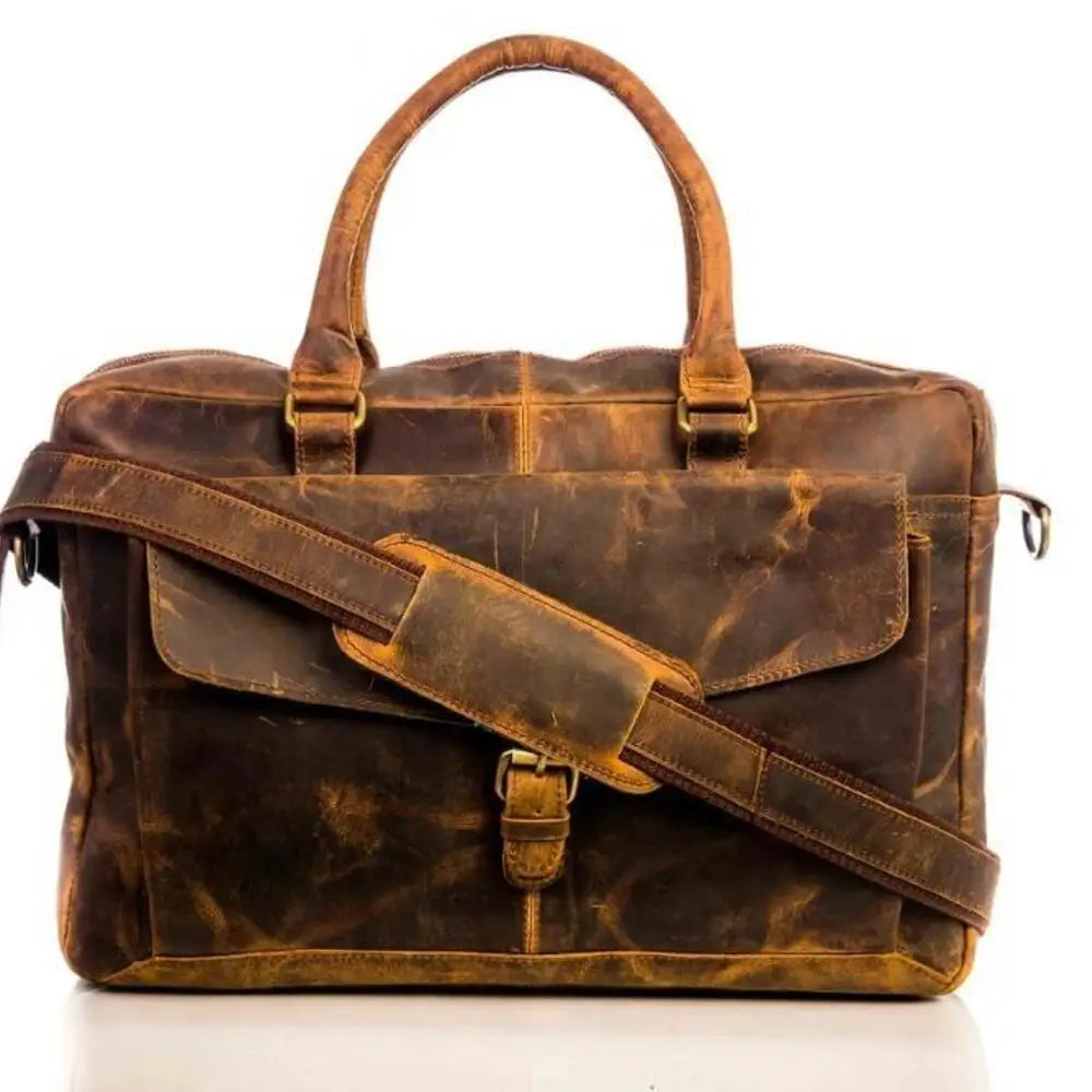 Brown distressed PU leather travel duffle bag, crossbody style with buckled front pocket, trunk design.
