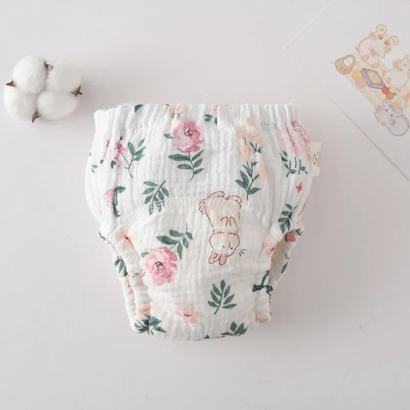 Muslin baby training diaper featuring a floral and bunny print for soft, breathable baby care.