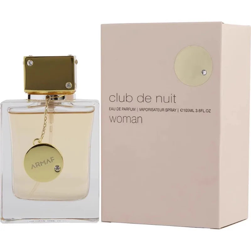 Armaf Club de Nuit Woman EDP 105ml: luxury square glass bottle with gold charm, elegant feminine eau de parfum spray.