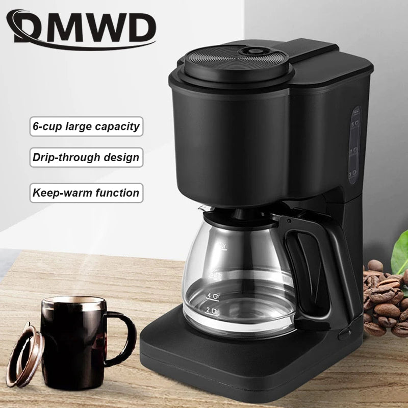 QMWD 6-cup drip coffee maker in black with glass carafe, keep-warm function, and visible water level indicator.