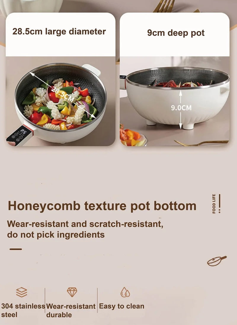 Electric nonstick cooking pot with steamer, showing inside food in a large white base