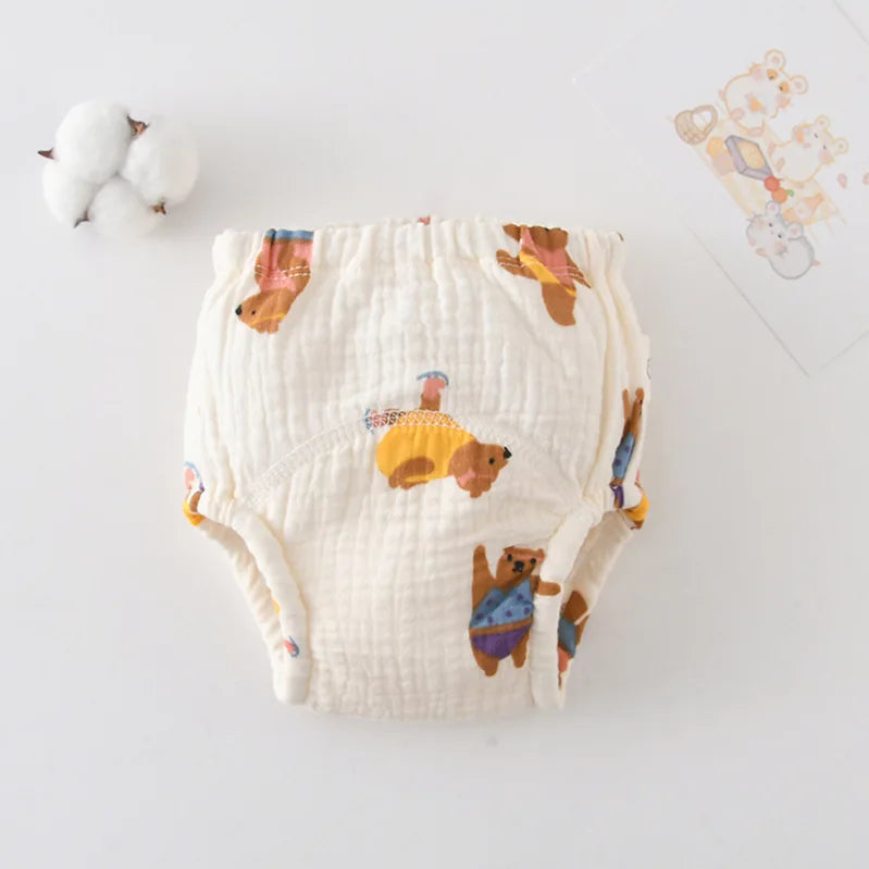 Cotton muslin baby training diaper with cute bear print pattern, perfect for soft, breathable baby care.