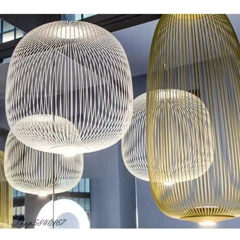 White and gold wire cage pendant lights in spherical and oval shapes, designed for hanging interior ceiling