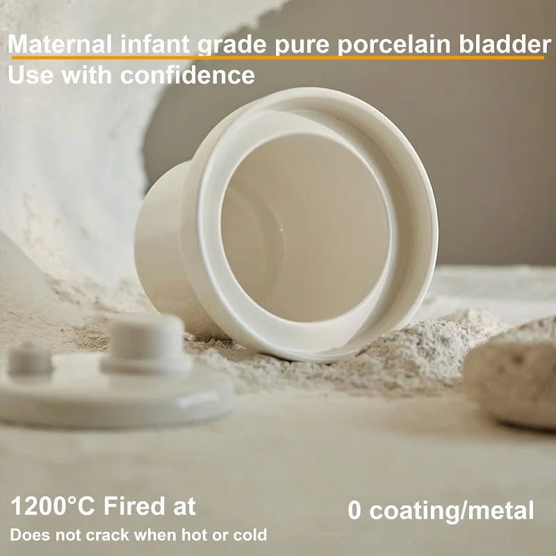 White ceramic inner pot removed, showing non-slip rim and lid opening