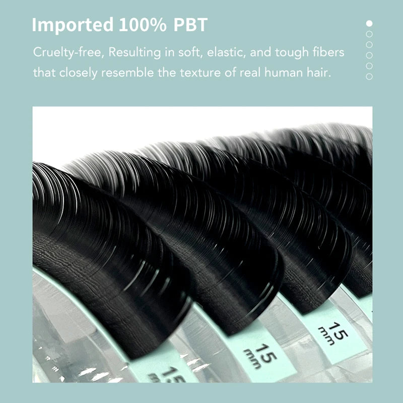 Close-up of black, soft PBT individual lash extension strips on a tray, highlighting natural, curved fiber texture.