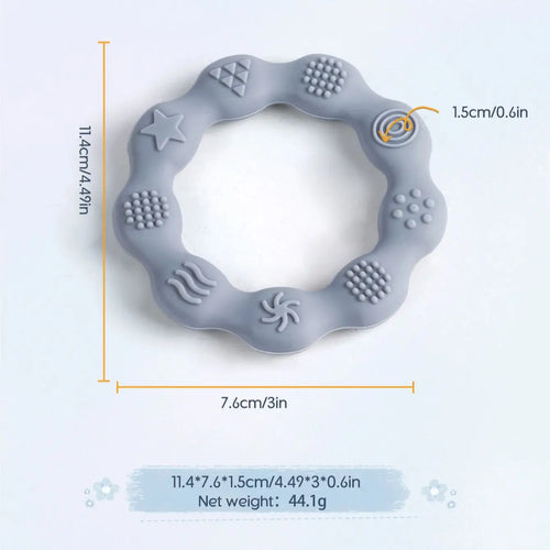 Grey silicone teething ring for baby, textured relief for soothing gums during teething.
