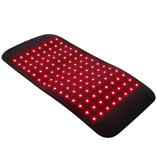 Flexible red light therapy LED device, rectangular wellness mat with multiple bright red therapeutic light nodes.