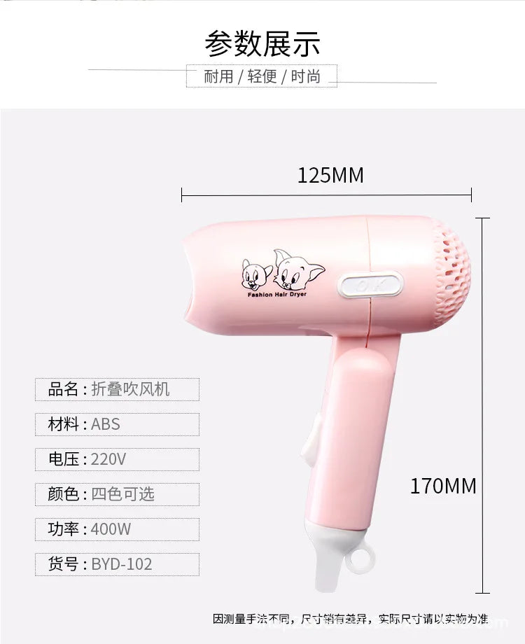 Pink foldable mini travel hair dryer, 400W low-power portable blower with cute cartoon print for home and dorm use.