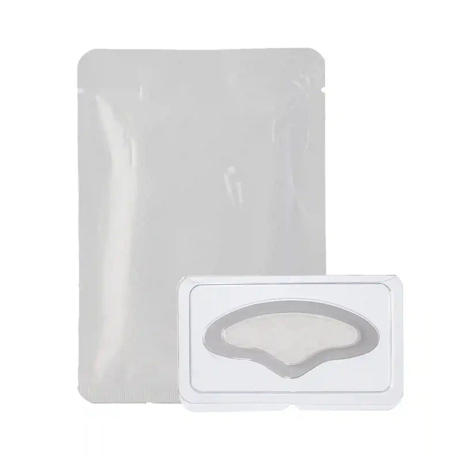 A white, rectangular product pouch beside a clear plastic tray containing a crescent-shaped microneedle forehead patch.