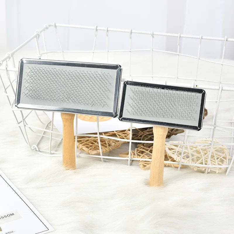 Two dog and cat slicker brushes with wooden handles for pet grooming and removing shedding hair from clothes.