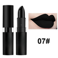 Waterproof matte black lipstick in a sleek tube, showing a bold, highly pigmented swatch on lips.