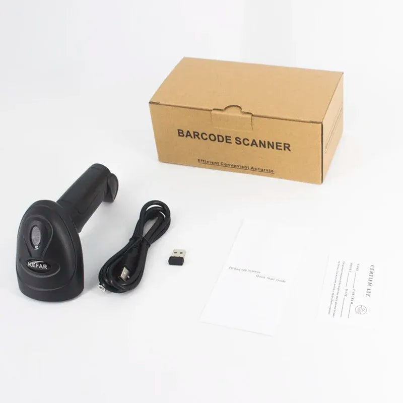 Black barcode scanner and USB dongle with cable and documents beside a box