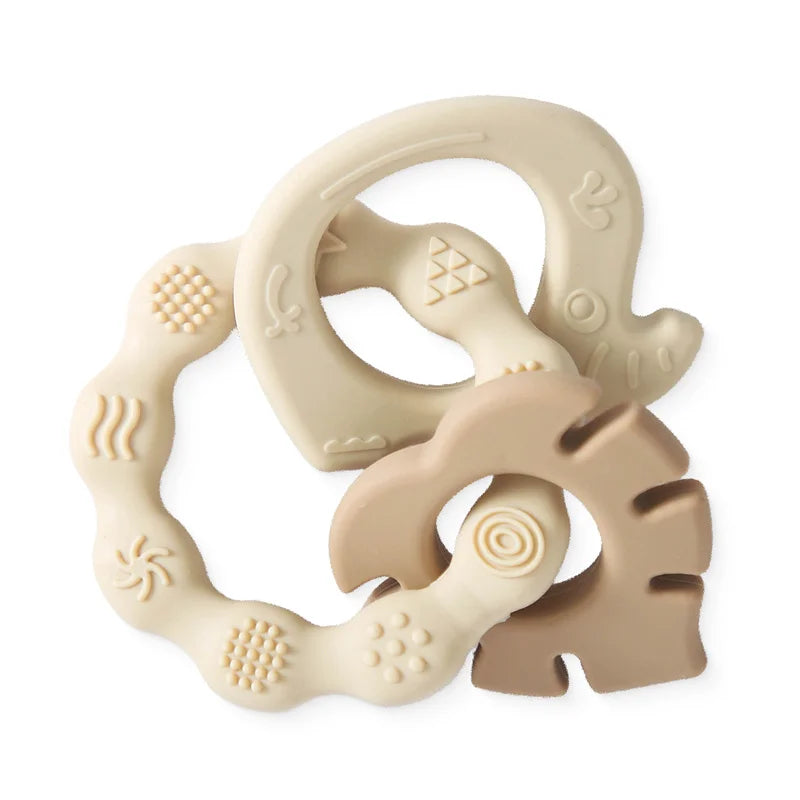 Beige and tan silicone teething rings for baby relief, textured sensory toy.
