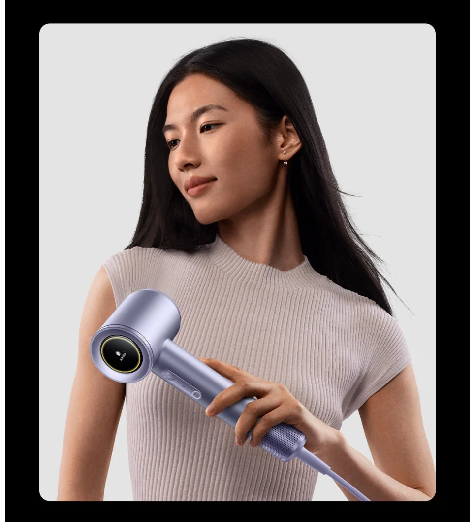 Woman using purple MIJIA High Speed Water Ion Hair Dryer Pro with digital display for fast, quiet, professional styling.