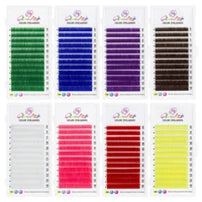 Eight trays of multi-colored synthetic eyelash extensions for professional application.