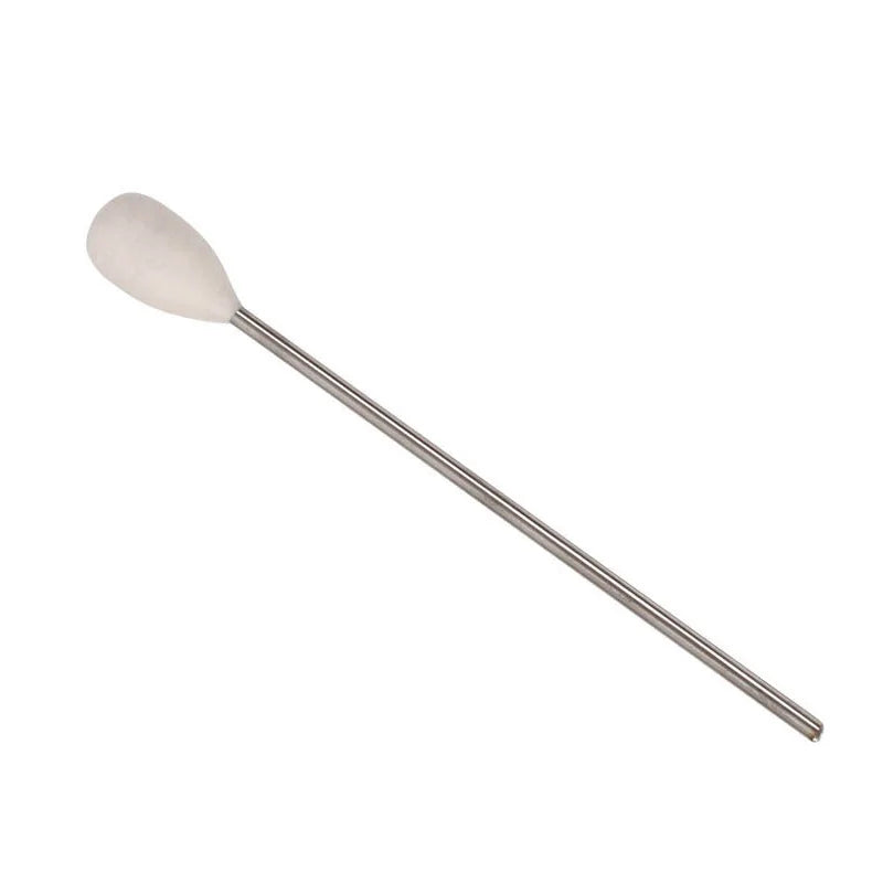Metal fire cupping ignition rod with white cotton tip for professional and home fire cupping therapy.