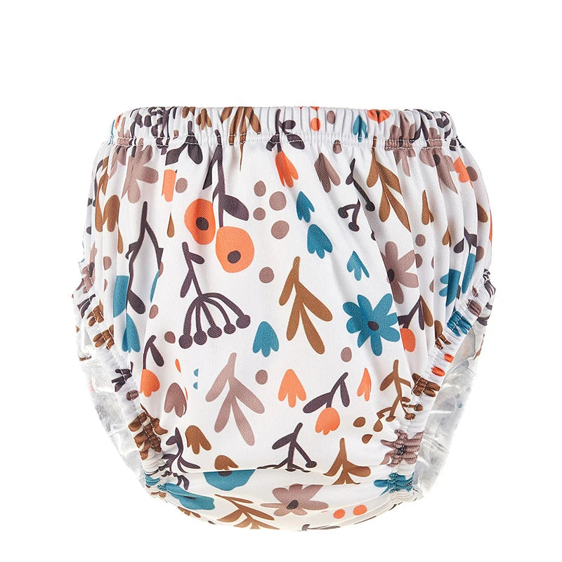 Reusable baby swim diaper with white and orange floral print, elastic waistband and leg openings.