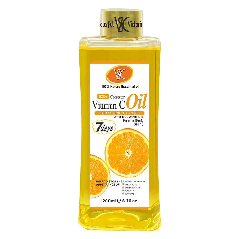 Vitamin C body massage oil bottle with gold cap, yellow translucent bottle with citrus label.