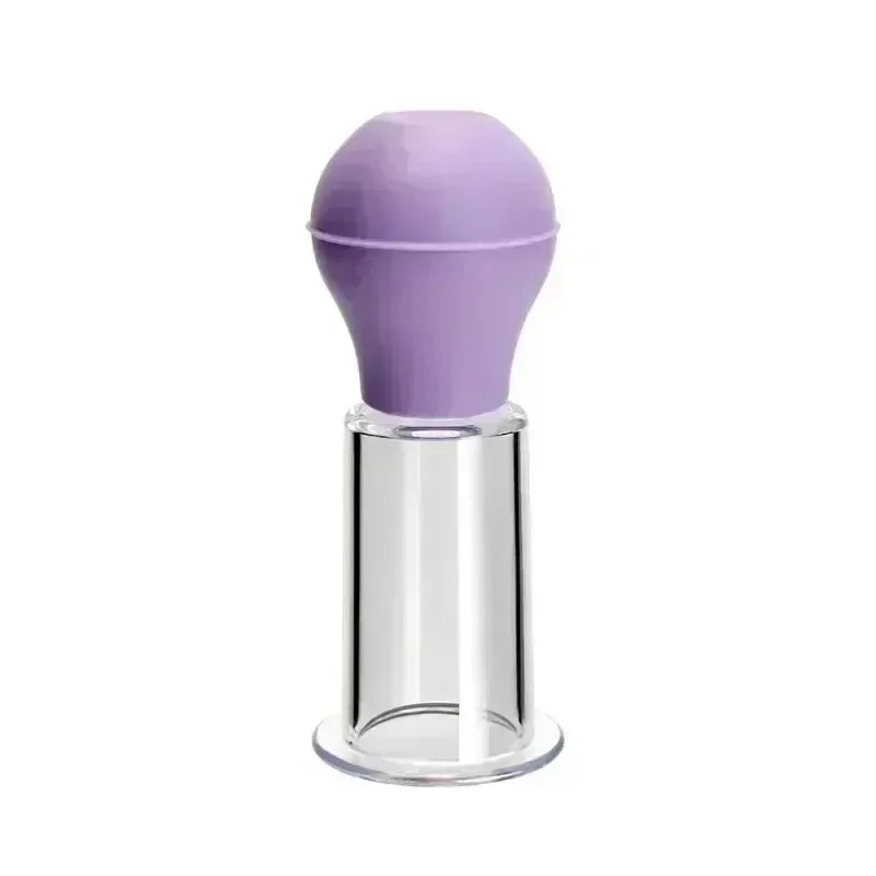 A facial massage cupping tool with a lavender bulb and a clear, cylindrical base against a white background.