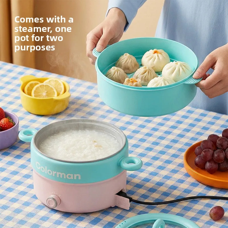Turquoise electric steamer pot with lid and dual handles, basket steaming dumplings