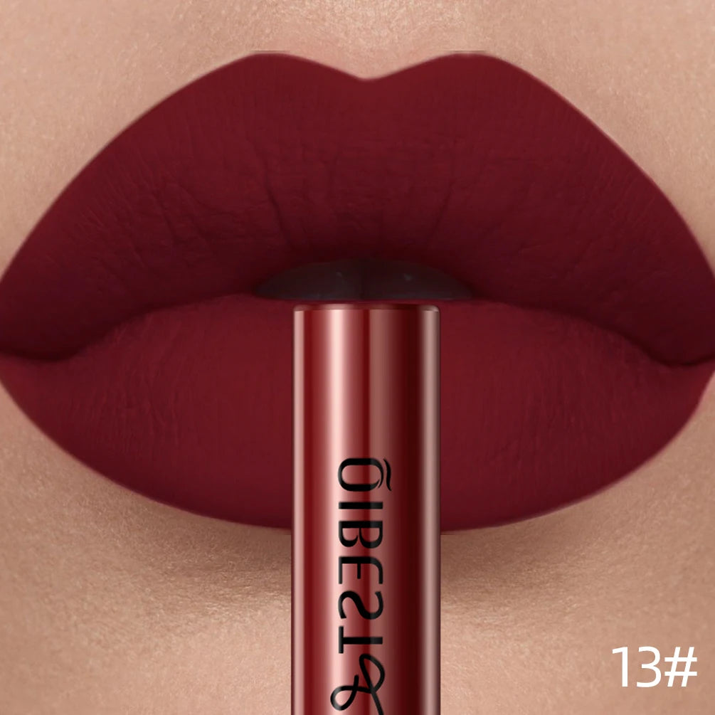 QIBEST long-lasting velvet liquid lipstick in deep red matte shade. Lips wearing sexy, nonstick, smooth matte makeup.