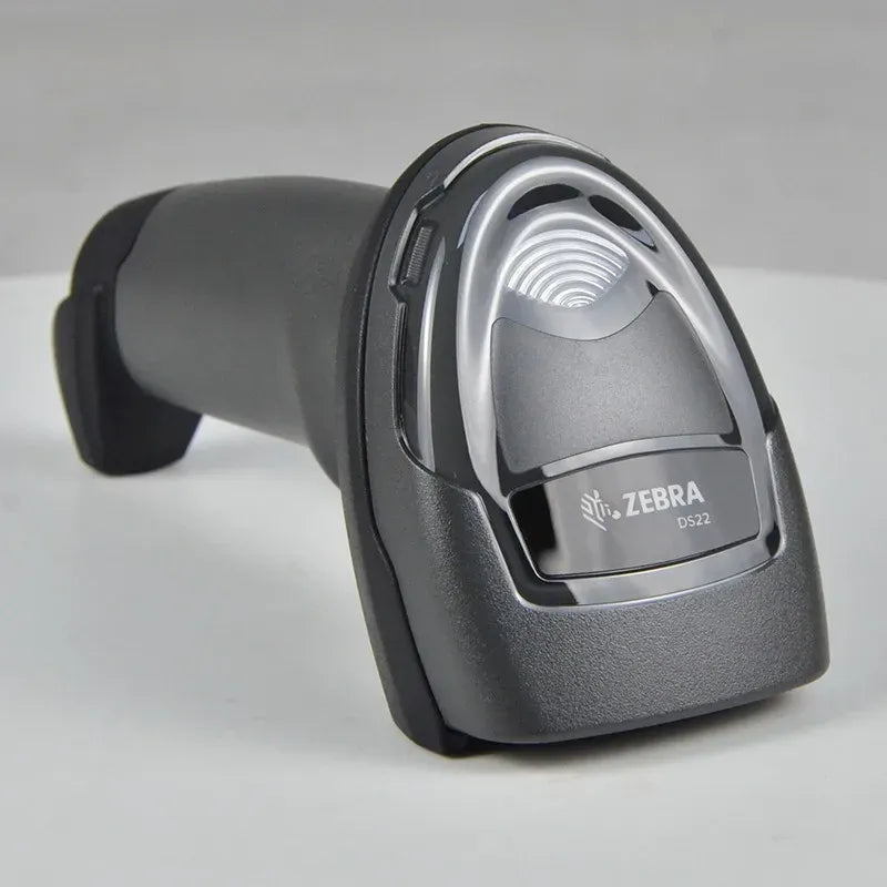Zebra DS2208 2D wired handheld barcode scanner, angled view of trigger and scan lens